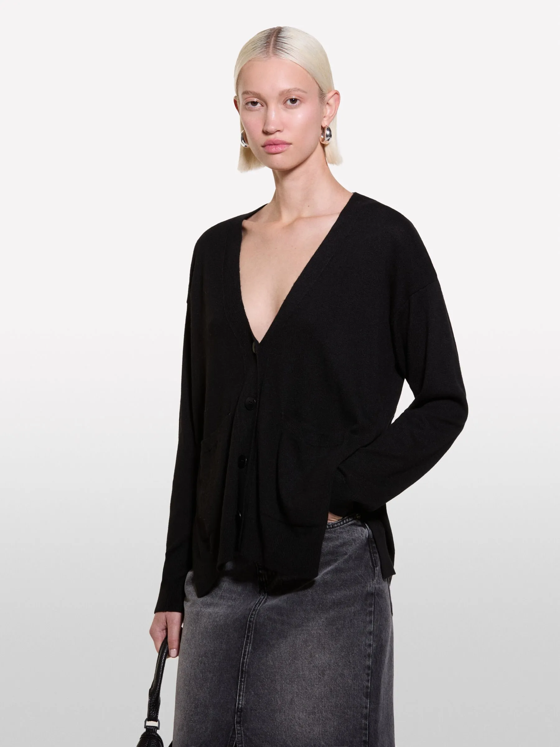 Nuovi arrivi      Cardigan nero con spacchi